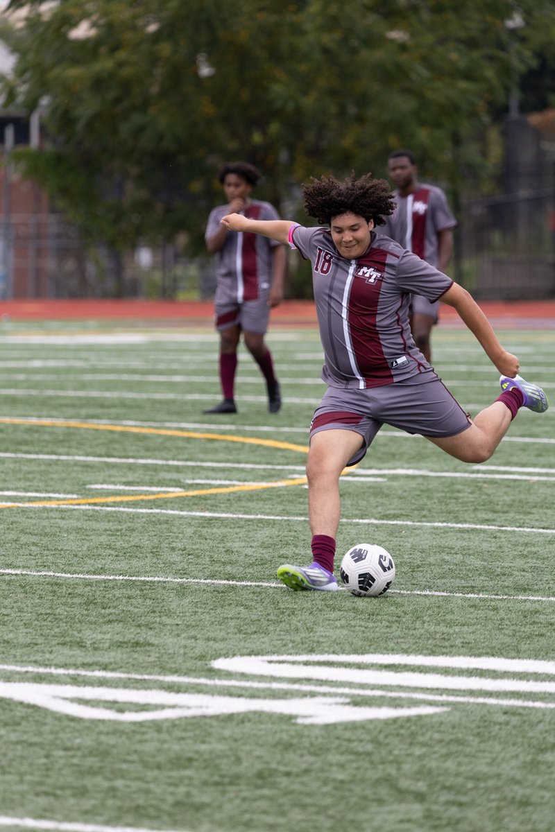 Soccer player mid-kick